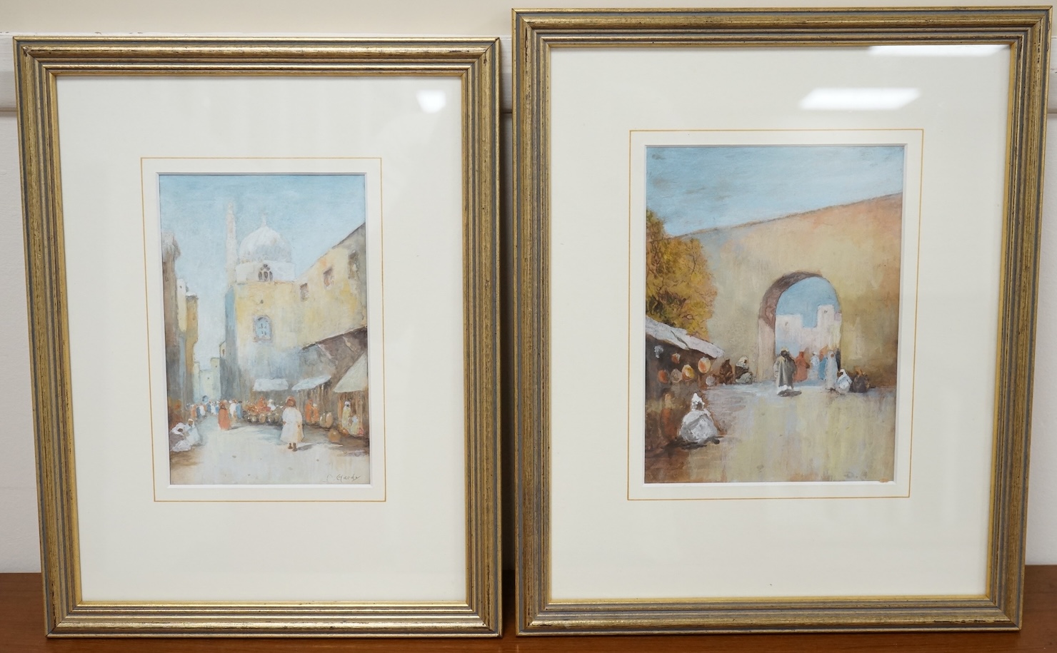 Dudley Hardy ROI RBA (1867-1922), pair of Orientalist watercolour and mixed medias, Street scenes, one with sketch attributed to Edward Lear verso, each signed, 19 x 14cm